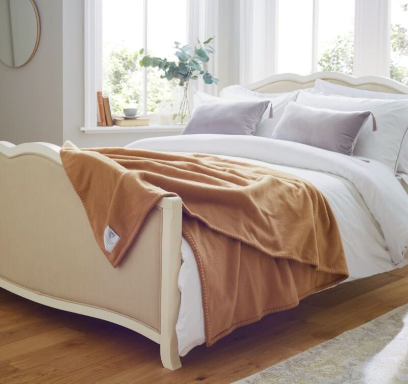 John Atkinsion Siesta Double Camel Draped on Bed