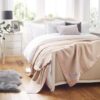 100% Cashmere blanket on bed