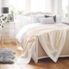 John Atkinson Cashmere De Lux Blanket White Silk on bed