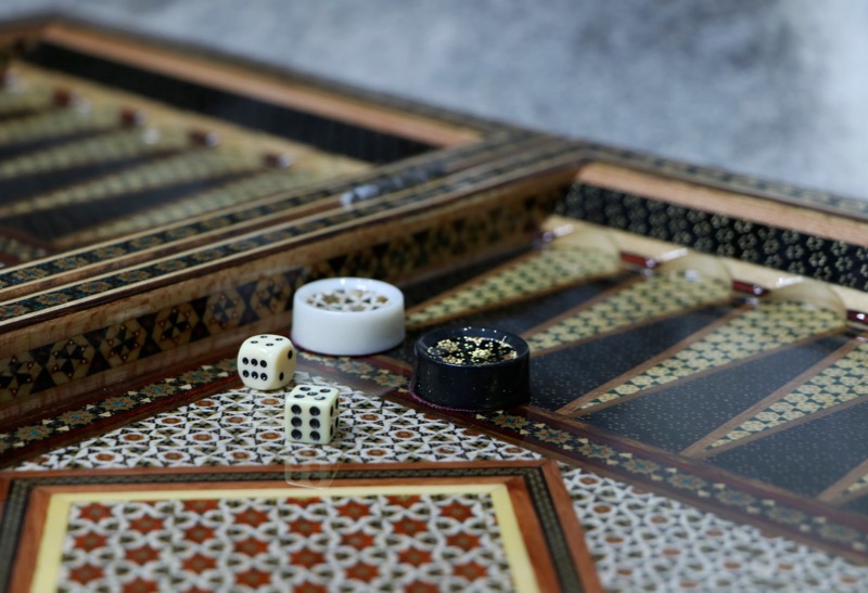 ornately designed wooden backgammon boards