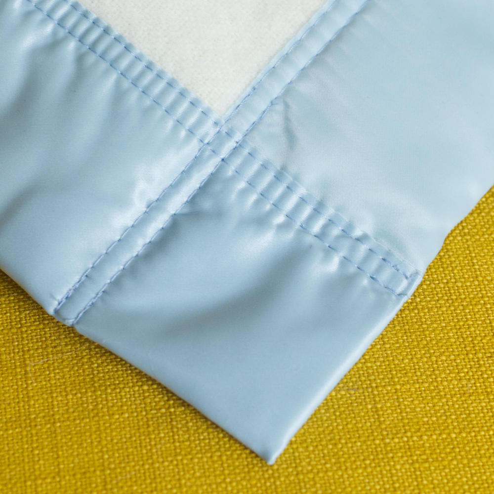 John Atkinson 100% Merino Wool baby blankets with blue satin trim for cots and prams